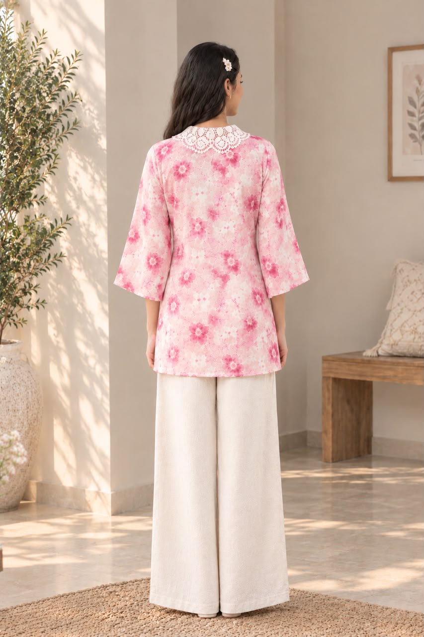 Pink and white floral printed women’s top